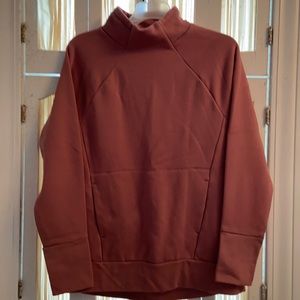 Size small in a neutral pink